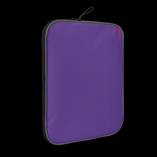 Slim-profile Purple Blank Slate tech sleeve showing the impact-resistant padded edges for MacBook and iPad protection.