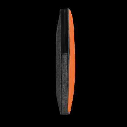 Minimalist back view of the water-resistant Orange Blank Slate sleeve from the Classified Bag collection.