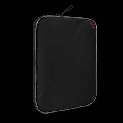 Slim-profile Black Blank Slate tech sleeve showing the impact-resistant padded edges for MacBook and iPad protection.