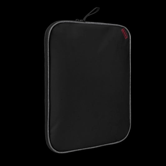 Slim-profile Black Blank Slate tech sleeve showing the impact-resistant padded edges for MacBook and iPad protection.